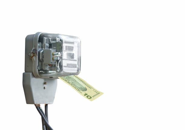 electric meter with money banknote for paying or refunding bill on white background stock photo