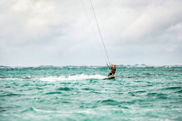 istock Mature man Kiteboarding at Mauritius island. 1212196516