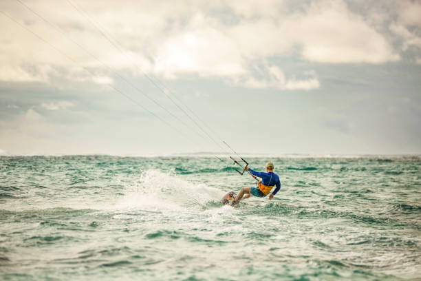 istock Mature kiteboarder kitesurfing on Mauritius island. 1212197497