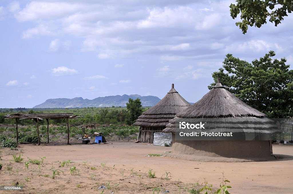 African houses Traditional African thatched-roof houses in the countryside in South Sudan South Sudan Stock Photo
