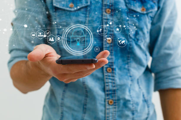 istock Security and Insurance Data Industry 4 Concept. Worker touched shield lock icon on virtual screen. Industrial safety, smart manufacture protection information technology integration. 1212209080