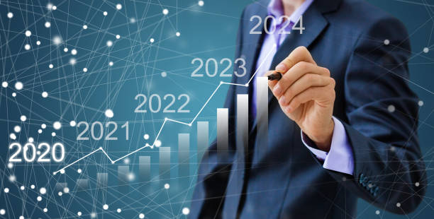 istock Man finds 2021 year in virtual archive, collection of statistics, annual reports 1212209330