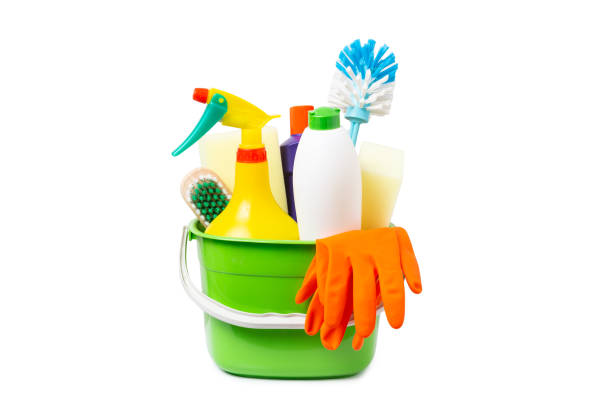 istock cleaning tools and products in bucket isolated on white background 1212210233