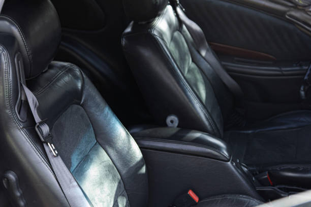istock black leather car seats, combination leather. 1212211472