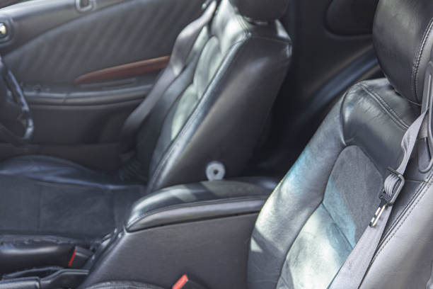 istock black leather car seats, combination leather. 1212211605
