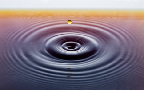 istock rippling after a few drops of coffee. 1212211858