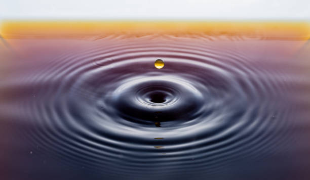 istock rippling after a few drops of coffee. 1212211923