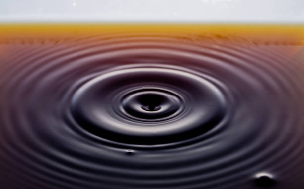 istock rippling after a few drops of coffee. 1212211964