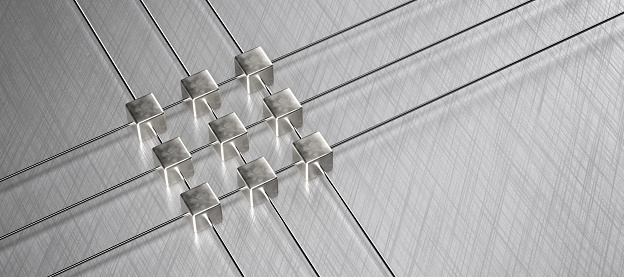 cube grid on brushed aluminum background symbolizing network nodes - 3D rendered illustration