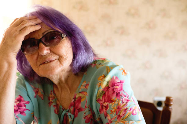 istock Portrait of a senior lady having headache 1212214260