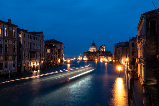 Grand Canal and Santa Maria della Salute in Venice Italy at night. Horizontal composition.