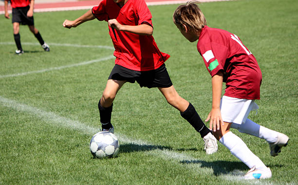 istock children are playing soccer 121222785