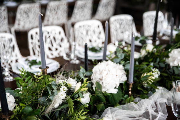 istock Festive banquet decorated with green branches 1212228130