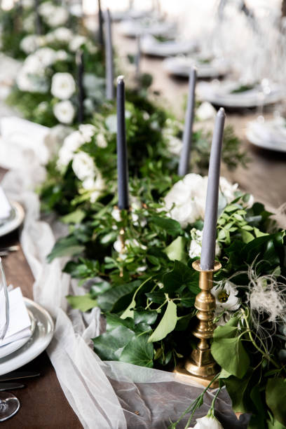 istock Festive banquet decorated with green branches 1212228143