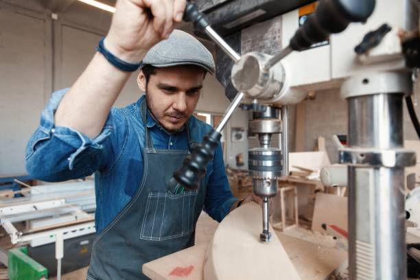 istock Successful handsome businessman with stylish cap work in carpentry 1212230520