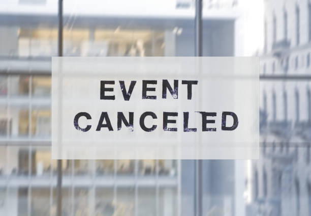 istock Door sign event canceled 1212231756