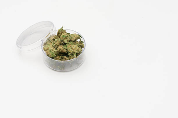istock Marijuana cannabis Medicinal, weed joint In a glass container, drugs. 1212231813