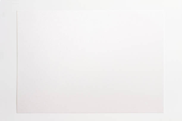 istock Blank design textured a4 paper sheet on white for using as texture or template for logo presentation, embossing etc. 1212231935