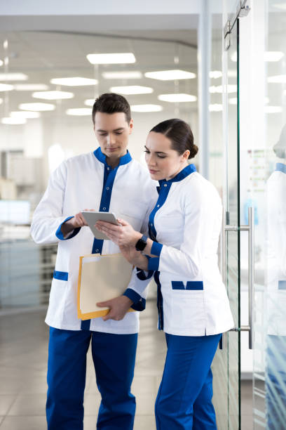 istock Medical workers using digital tablet in clinic 1212234726