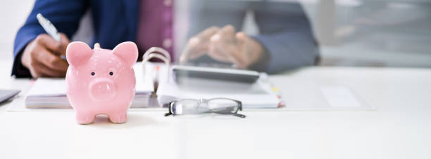 istock Businessman Calculating Invoice On Desk 1212241522