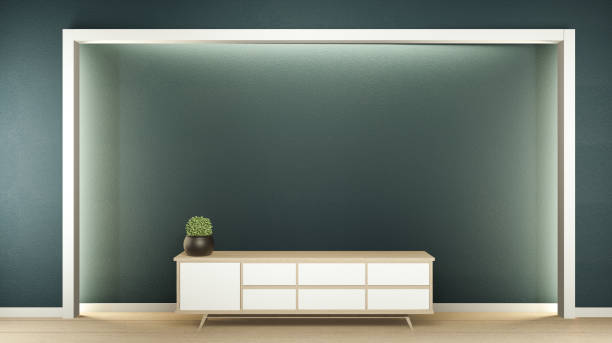 istock cabinet in modern blue green dark room wall hidden light design. 3D rendering 1212241635