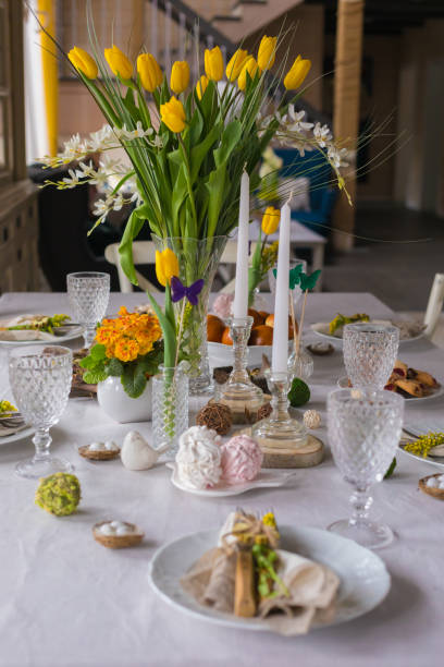 istock Easter festive spring table setting decoration, eggs in nest, selective focus, toned, top view 1212245628