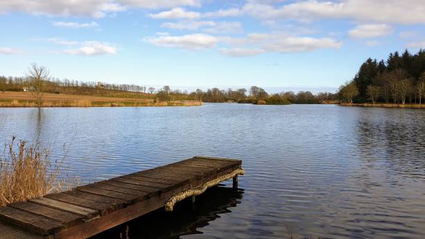 istock Fishing jetty and lake 1212246650