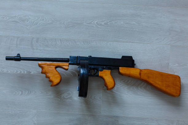 istock thompson sub-machine gun look alike on white 1212252399
