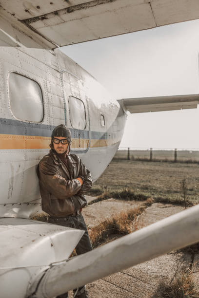 istock Handsome young man wearing aviator glasses outdoors 1212252855