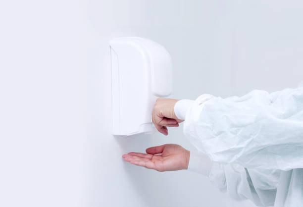istock Alcohol dispenser in hospital 1212253683