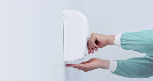 istock Alcohol dispenser in hospital 1212253684