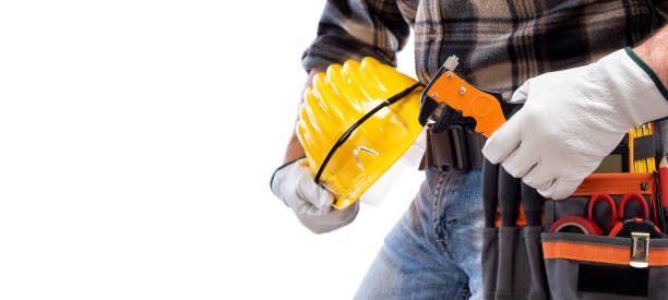 istock Electrician with tool belt on a white background. Electricity. 1212253915