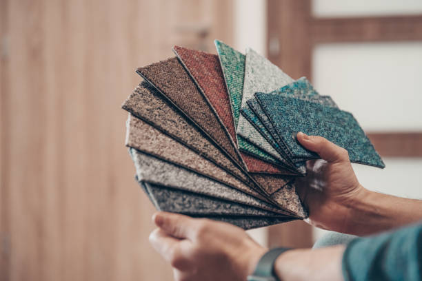 istock sample of colored carpets in floor shop 1212259570