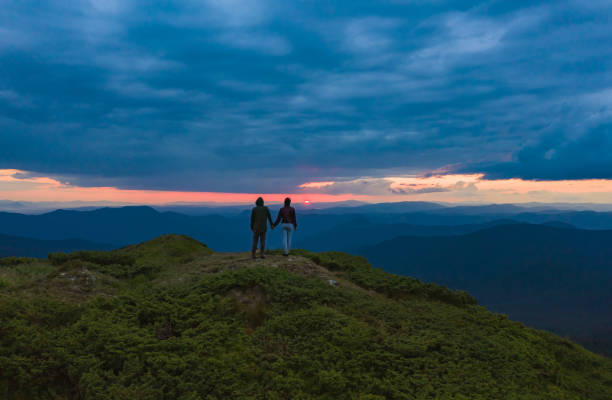Free Stock Photo of Couple Standing on Top of Hill | Download Free ...