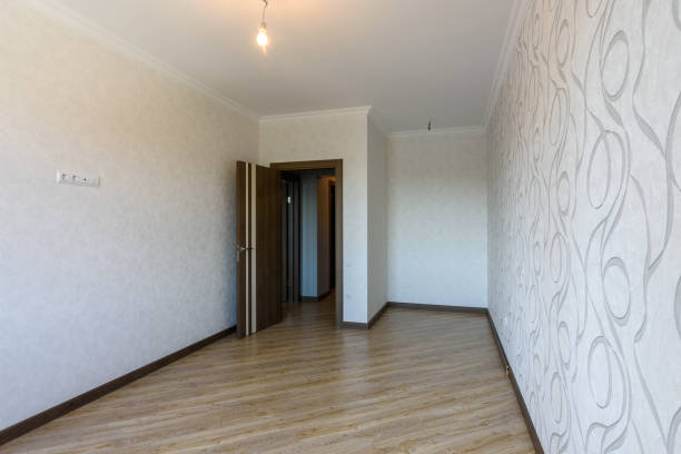 istock Exit to the balcony from the future bedroom in the interior of the empty room 1212263592