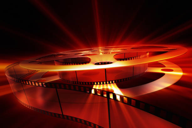 Film reel with shine. XXXL size background Film reel with shine. XXXL size background film premiere stock pictures, royalty-free photos & images