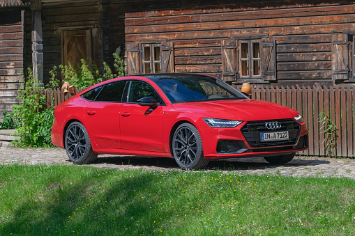 bang rent Den anden dag Red Audi A7 Sportback On A Street Stock Photo - Download Image Now - Car,  Red, Street - iStock