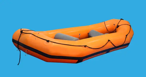 Photo of Rubber boat on blue