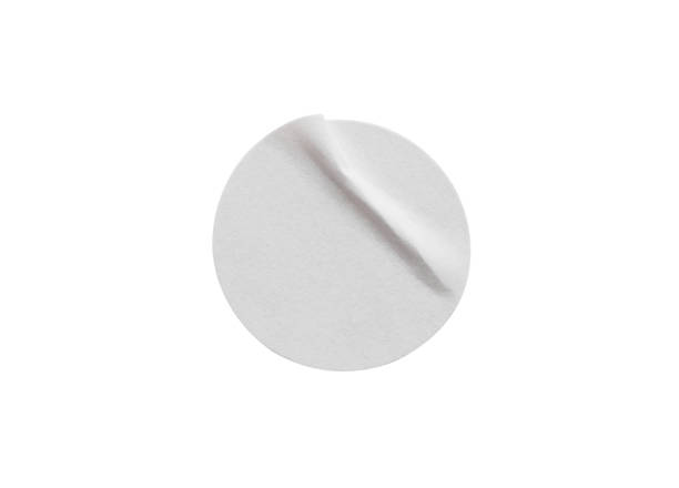 istock Blank white round paper sticker label isolated on white background with clipping path 1212275739