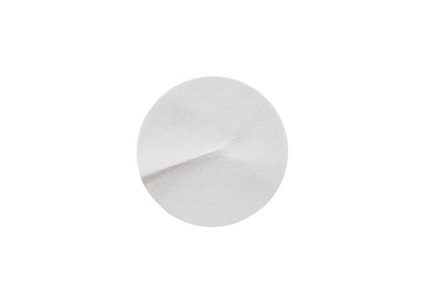 istock Blank white round paper sticker label isolated on white background with clipping path 1212275740