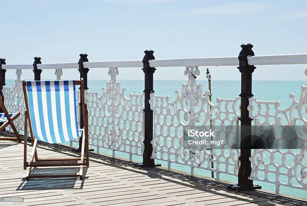 Beach chair on the pier  Beach Stock Photo