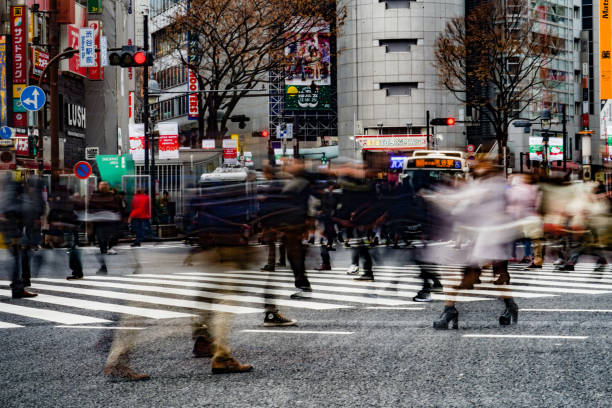 istock Hustle and bustle of Shibuya scramble intersection 1212284299