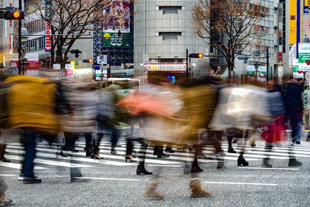 istock Hustle and bustle of Shibuya scramble intersection 1212284302