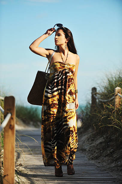 Stylish Young Hispanic Woman on Beach