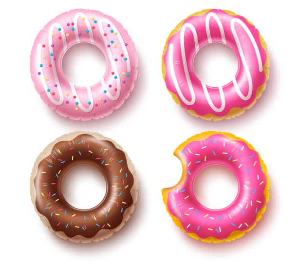 istock Summer floater donuts set vector design. Inflatable swim rings and rubber toy swimming elements 1212294849