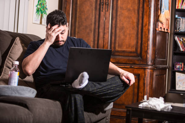 istock Man working from home due to the corona virus 1212296953