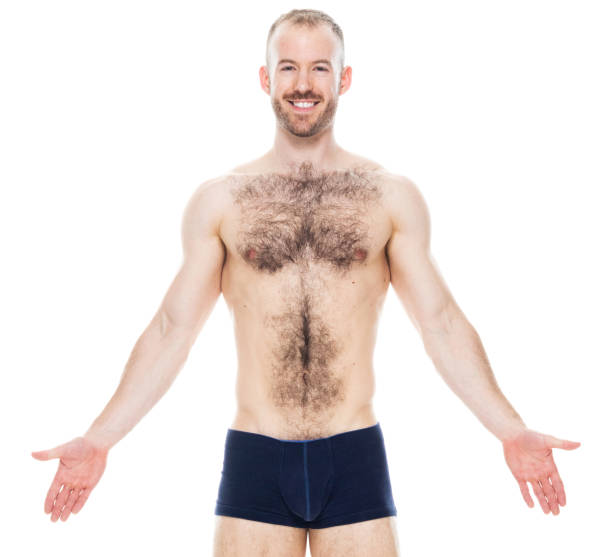 Caucasian young male in front of white background wearing men's underpants Portrait of aged 30-39 years old with with beard caucasian young male in front of white background wearing men's underpants who is shirtless body hair stock pictures, royalty-free photos & images