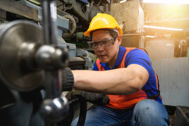 istock Asian Industrial workers are working on projects in large industrial plants with many devices. 1212305114