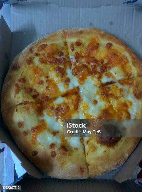 Cheesy Pizza From Dominos India Stock Photo - Download Image Now - Baked, Cheese, Close-up