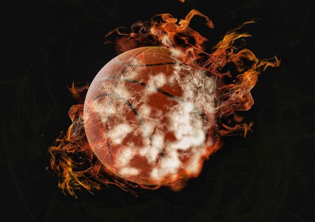 istock Abstract basketball wrapped in flames and smoke 1212307796